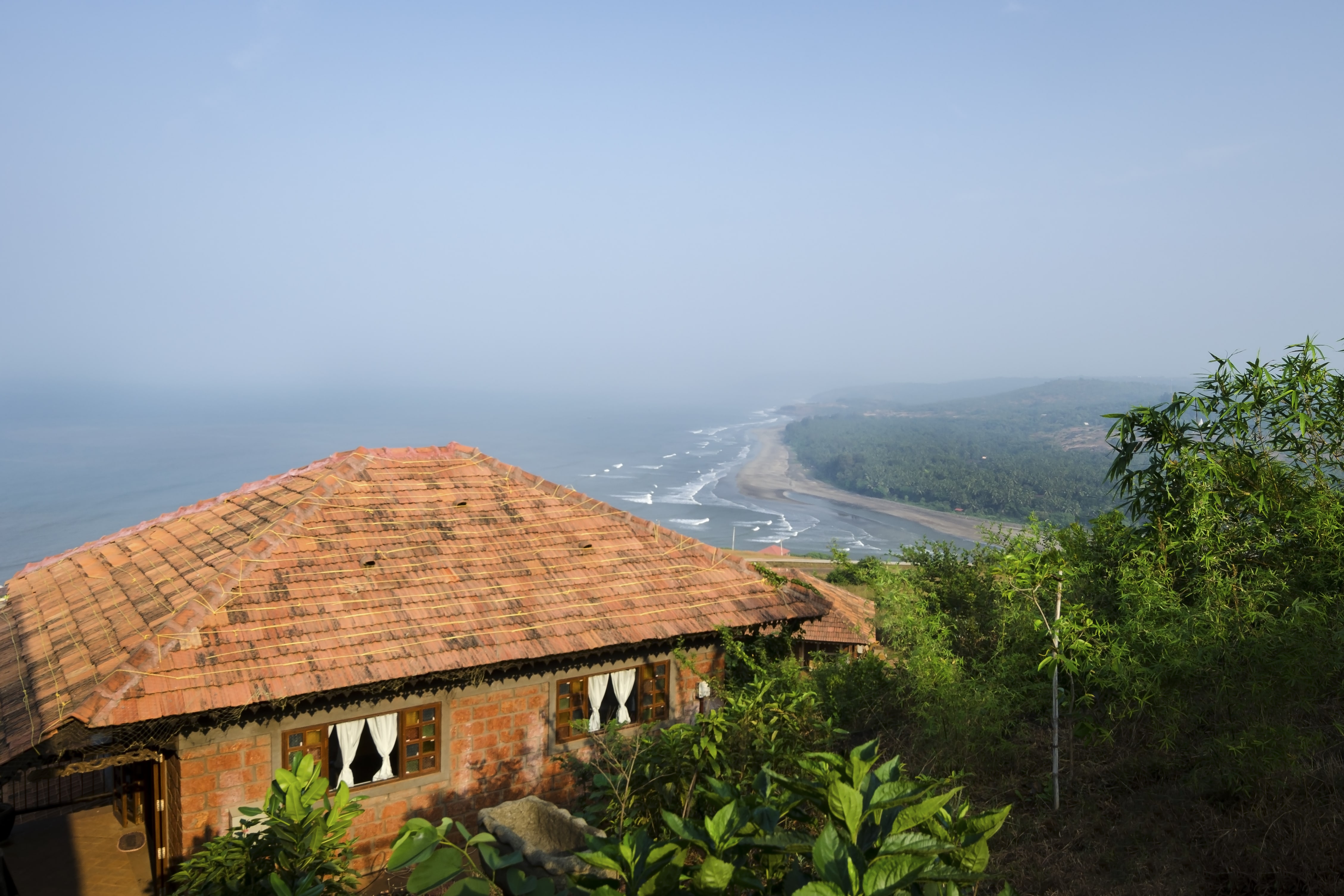 Let the breeze at this sea facing villa in Dapoli calm your soul.
