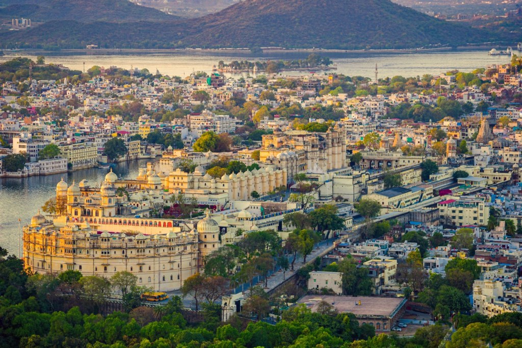 City Palace Udaipur seen across Lake Pichola at golden hour